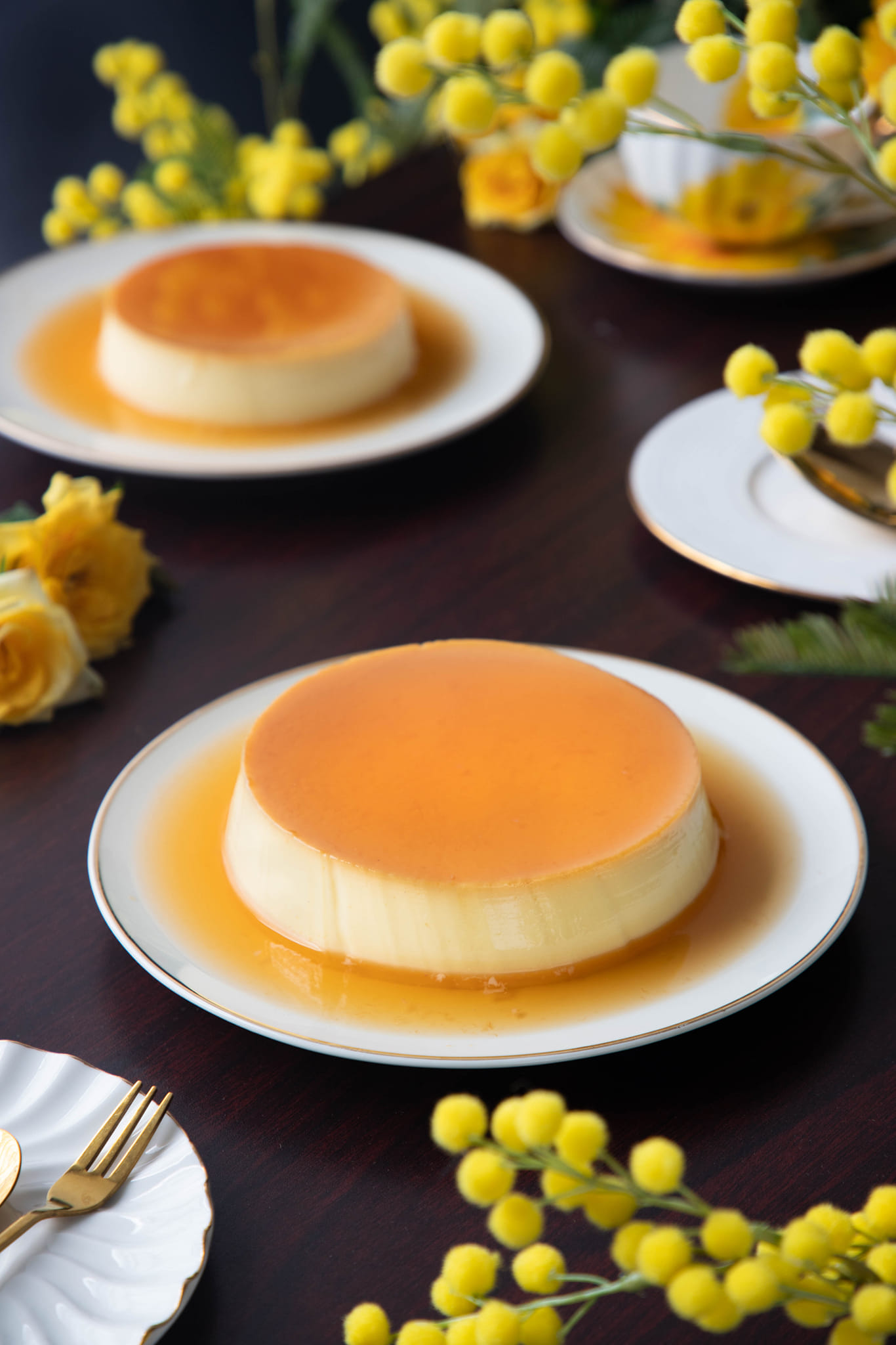 Caramel custard on white dish